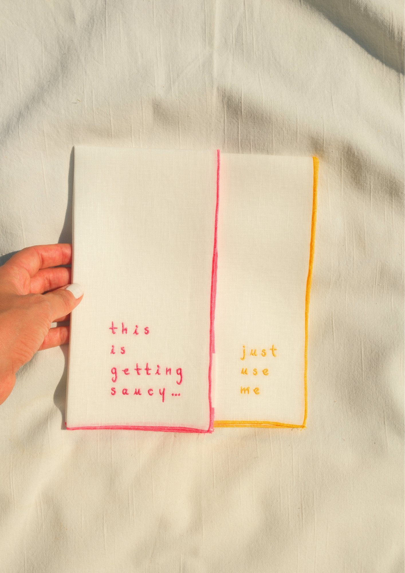 "The Cheeky Duo" —  Set of 2 — Embroidered Linen Napkins